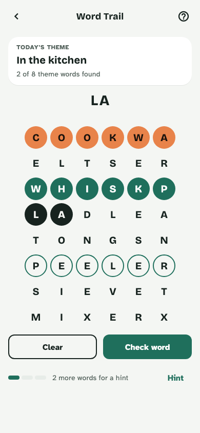 The Word Trail: a grid of letters with found theme words filled in